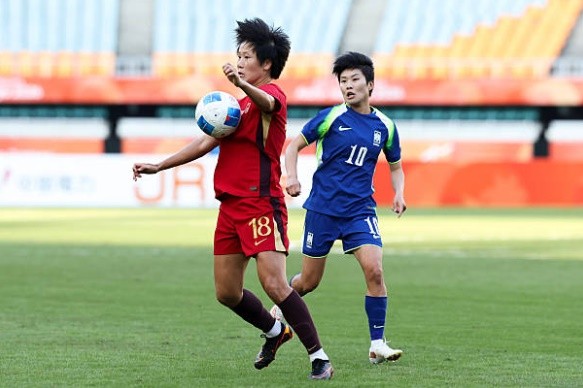 Nữ Hàn Quốc đánh bại nữ Trung Quốc để giành huy chương đồng. Ảnh:  Zhizhao Wu/Getty Images.