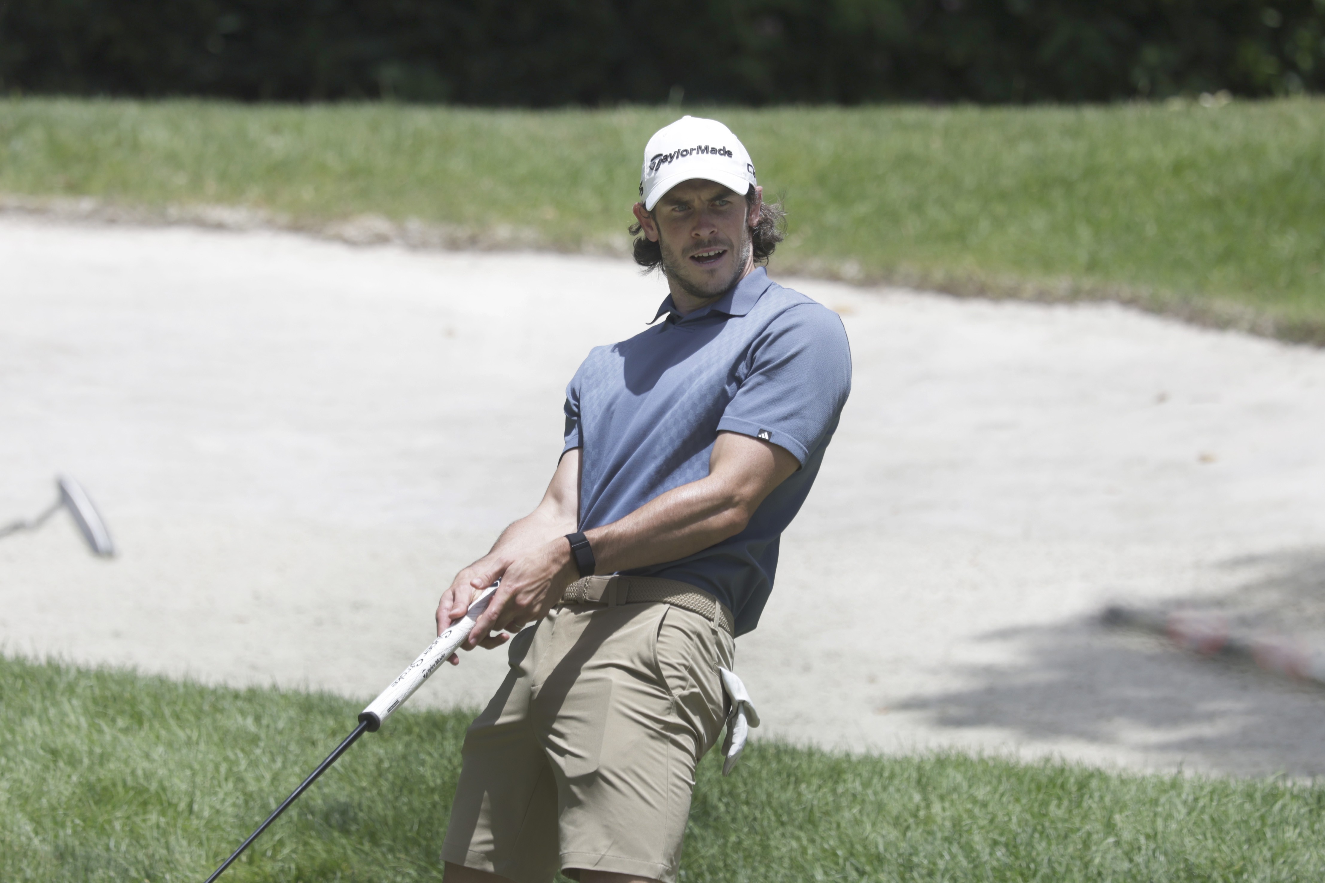 Từ sân bóng đến sân golf với phong cách riêng biệt. (Ảnh: EPA Images)