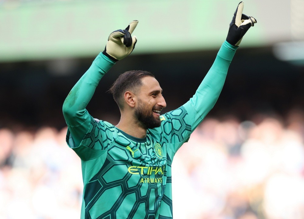 Donnarumma là chốt chặn đáng tin cậy của Man City. Ảnh: EPA.