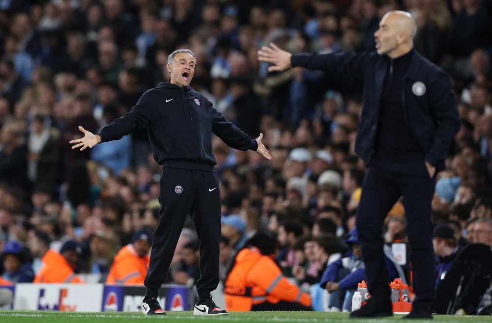 HLV Luis Enrique thừa nhận PSG may mắn khi thắng Man City. Ảnh: EPA.