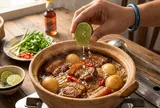 Vì sao nên vắt thêm vài giọt chanh khi làm thịt kho tàu?