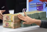 Có 200 triệu nên mua vàng hay gửi tiết kiệm để thu lợi nhuận cao hơn?