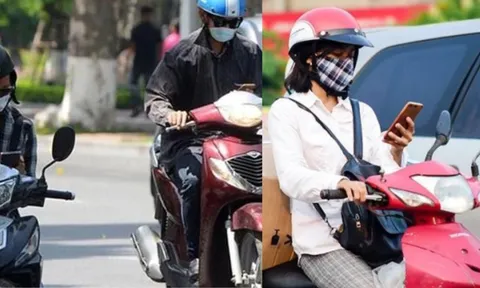 Vừa đi xe máy vừa nghe điện thoại bị phạt tới 14 triệu đồng đúng không? Dừng xe nghe điện thoại có bị phạt?