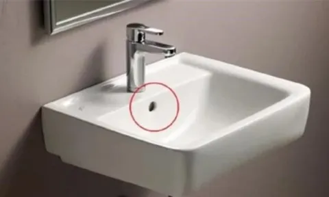 Bồn rửa mặt thường có một lỗ tròn nhỏ, nó dùng để làm gì?