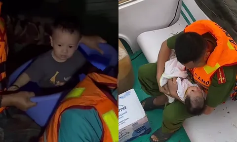 Xót xa đến đau lòng hình ảnh các em bé chạy lũ cùng bố mẹ, khiến ai nhìn cũng nghẹn lòng “Thương quá”
