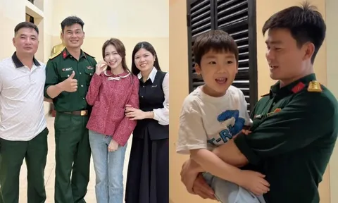 Đại úy Thăng Văn Cương "ra mắt" Hòa Minzy với đồng nghiệp, bé Bo được bố công khai bế đi khắp đơn vị