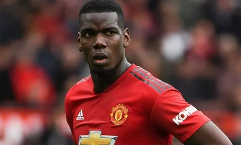 Man United dùng Paul Pogba tiếp cận Varane
