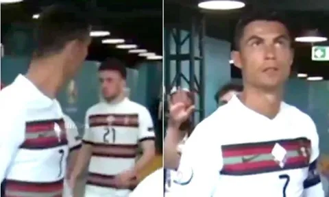 Ronaldo lắc đầu ngao ngán với đồng đội trong đường hầm