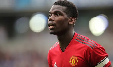 Bảo vệ Scholes, Neville khuyên Pogba làm cho Raiola im miệng