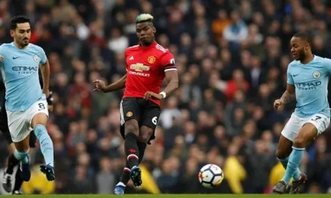 Neville chê Pogba lố bịch khi để tóc xanh
