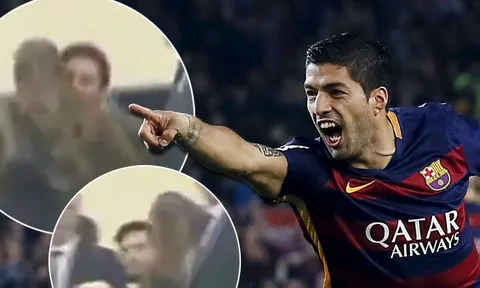 Messi ôm hôn con trai Suarez trong xe