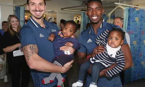 Fan nhí tròn xoe mắt khi được Ibrahimovic ẵm bồng
