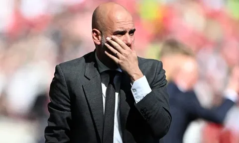 Cổ động viên MU phản ứng vụ Pep Guardiola rời Man City