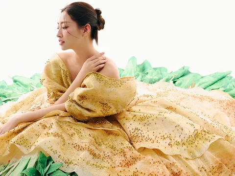 Lương Thùy Linh bưng nguyên mẹt rau sống, mặc váy bánh xèo thành nàng thơ Nam Bộ