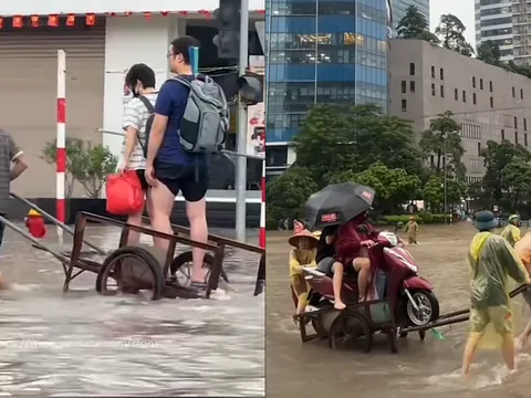 Xe chết máy hàng loạt trong ngập lụt, dịch vụ kéo xe bất ngờ ‘hái ra tiền’ ở Hà Nội