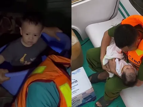 Xót xa đến đau lòng hình ảnh các em bé chạy lũ cùng bố mẹ, khiến ai nhìn cũng nghẹn lòng “Thương quá”