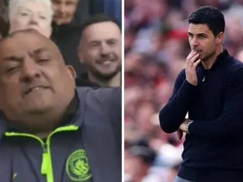 Cổ động viên Man City thực hiện cử chỉ chế nhạo Arsenal