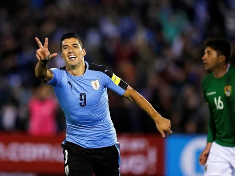 Luis Suarez lập cú đúp, Uruguay giành vé trong trận cầu 6 bàn thắng