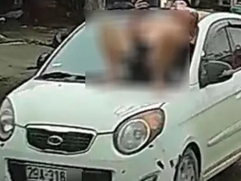 Người đàn ông nằm trên capo ô tô giữa phố Hà Nội: Hé lộ nguyên nhân bất ngờ