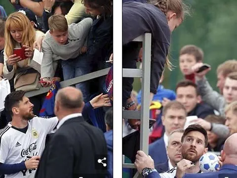 Fan nhí trèo rào để xin chữ ký Lionel Messi