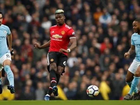 Neville chê Pogba lố bịch khi để tóc xanh