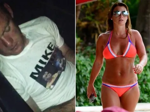 Rooney bắt sóng với gái lạ khi vợ vắng nhà