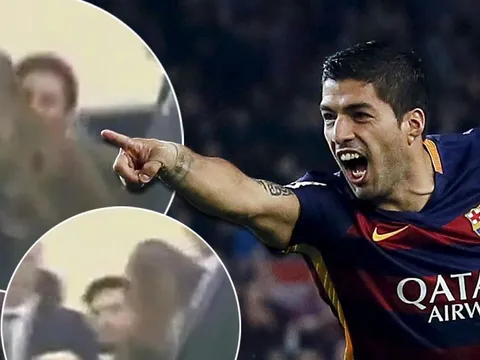 Messi ôm hôn con trai Suarez trong xe