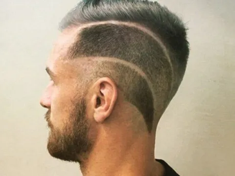 Bị Messi bắt chước, Ramsey lại thay kiểu tóc
